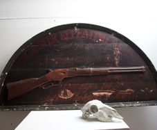 Winchester Riffle advertising sign