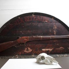 Winchester Riffle advertising sign