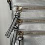 Silver crossbody handbag with contrasting gold zips & hardware  In excellent condition. Purchased in Toulouse Image 10