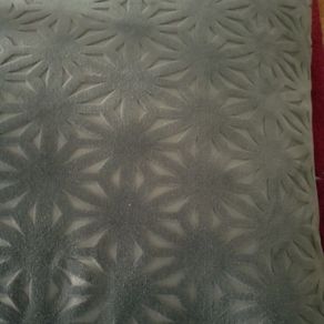 Grey velvet feather filled cushion