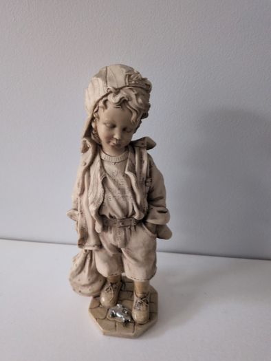 Beautiful Tall Boy Ornament.  Height : 10"