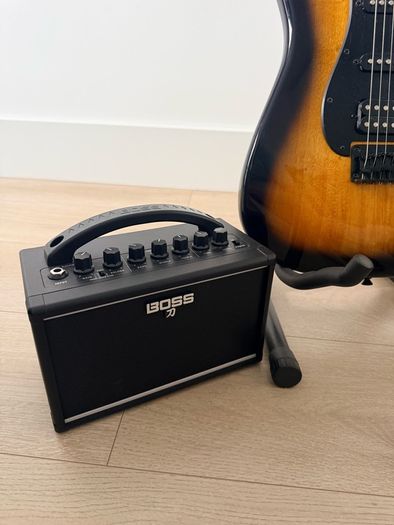Squier stratocaster by fender, Boss amp and accessories