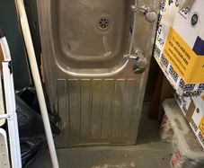 Kitchen sink with taps