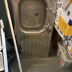 Kitchen sink with taps