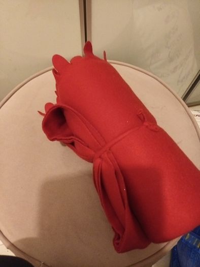 Red throw with scalloped edges