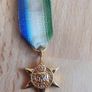 Brass British army cap badge for the Army Educational Corps (AEC) circa 1920 - 1946 & Atlantic Star, a British World War II campaign medal  copy Image 4