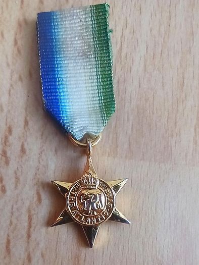 Brass British army cap badge for the Army Educational Corps (AEC) circa 1920 - 1946 & Atlantic Star, a British World War II campaign medal  copy