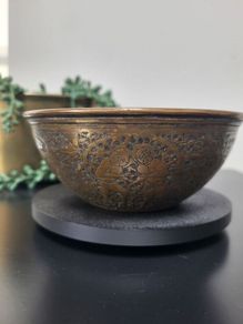Middle Eastern repousse brass bowl with intricate engraving. 12cm in diameter x 5cm high