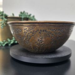 Middle Eastern repousse brass bowl with intricate engraving. 12cm in diameter x 5cm high