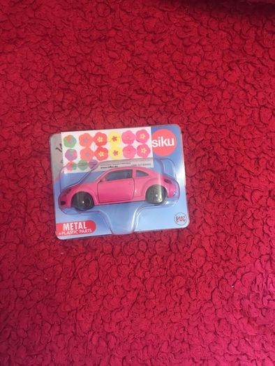 Toy car - brand new pink Volkswagen Beetle