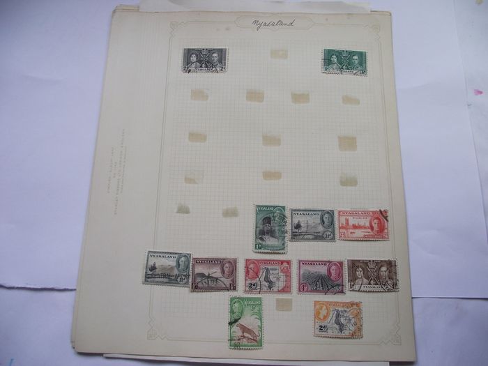 A collection of stamps from Northern Rhodesia, Southern Rhodesia, Rhodesia, South Africa and Nyasaland on loose pages