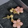 Gold plated pin earrings with enamel flowers pendants Image 9
