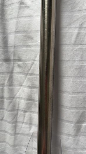 Curtain pole for eyelet curtains