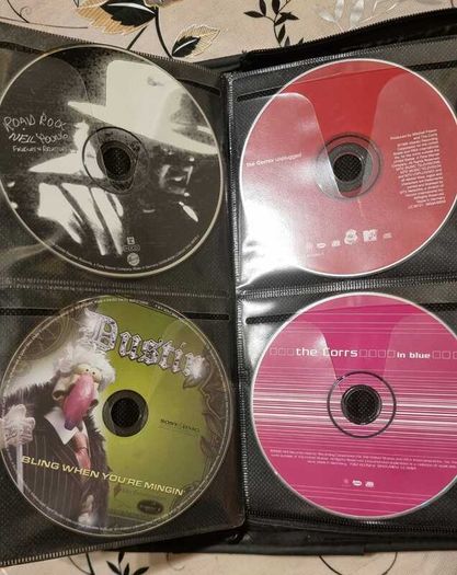 80 CD + Case. All CD's in perfect playable condition.