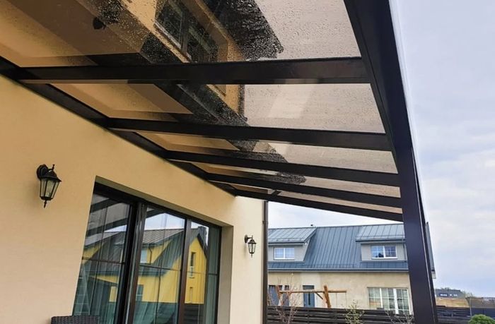 Tempered glass pergola with sliding door