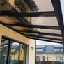 Tempered glass pergola with sliding door Image 5