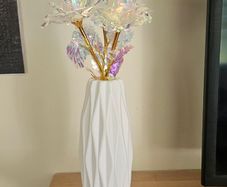 White vase with 3 golden roses