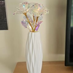 White vase with 3 golden roses