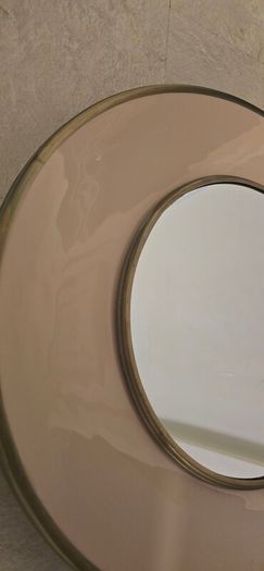 Deep round mirror detail and dusty pink