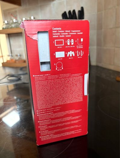 Nintendo Switch Neon Red/Blue with Improved Battery Life- Barely used