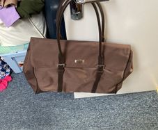 Travel bag - approx 17 inches wide. Approx 15 inches tall & approx 7 inches depth