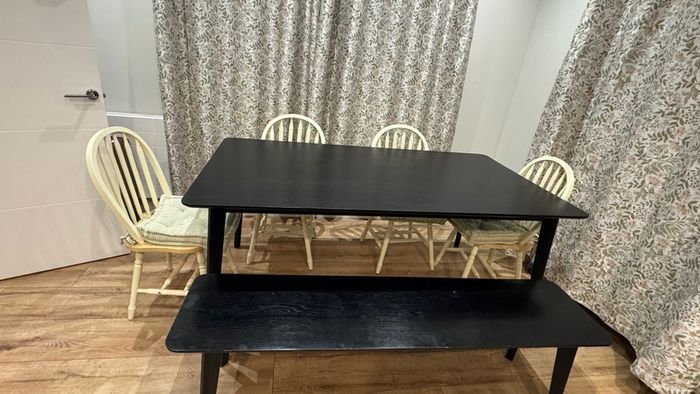 Oak wood black dinning table with a bench and 4 chairs