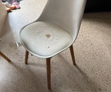 Two white bucket chairs