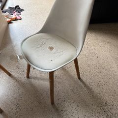 Two white bucket chairs