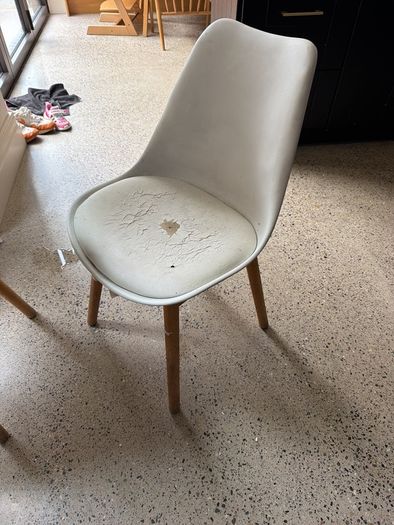 Two white bucket chairs