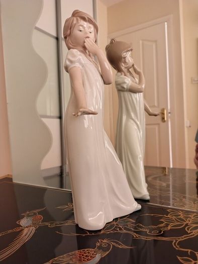 Nao by Lladro.  Yawning Girl. Damaged.