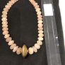 Pink stone, gold-coloured disc necklace Image 4