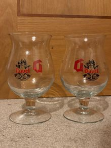 A pair of Duvel Belgian beer tulip glasses