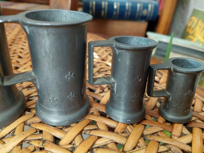 Antique French solid pewter measuring tankards Fleurs de lys complete set
