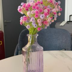 Purple clear vase and fake flowers