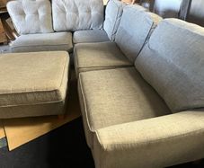 grey corner sofa with matching footstool couch
