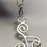 Sterling silver Triskele pendant on 18 or 20 inch chain. Image 5
