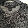 Black and white leopard print top. Size M 12/14 Image 2