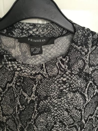Black and white leopard print top. Size M 12/14