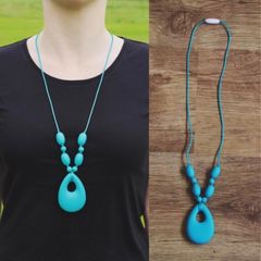 Turquoise teething necklace for babies and parents.