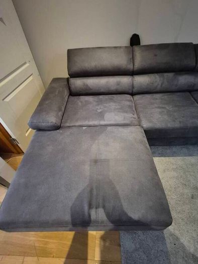 dark grey corner sofa with sleeping and storage