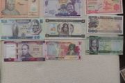 Lot of 9 Uncirculated Banknotes from Africa.No 14.
