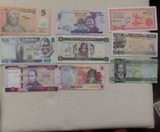 Lot of 9 Uncirculated Banknotes from Africa.No 14.