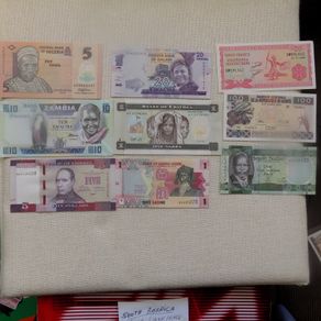 Lot of 9 Uncirculated Banknotes from Africa.No 14.