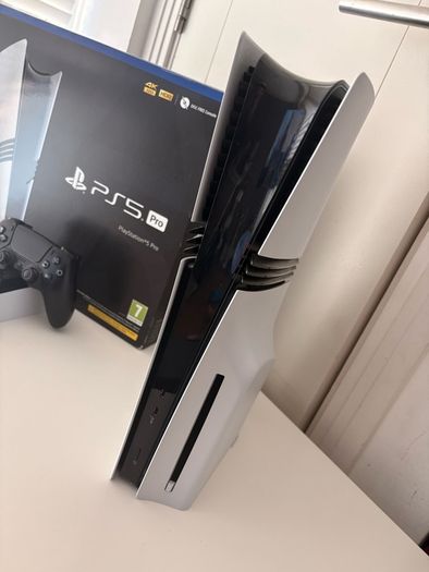 PS5 Pro 2tb With Disc Drive And God of War Rangarok