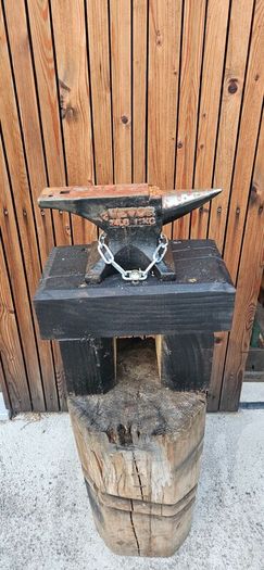 anvil on timber stand