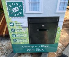 Brand new black letterbox