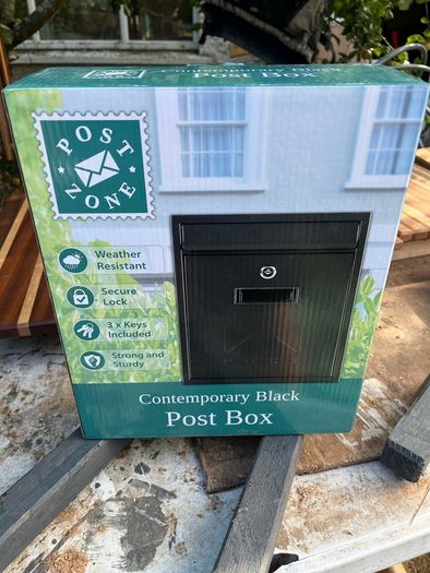 Brand new black letterbox