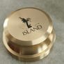 2 Papper Weight , Brass Papper Weight marked ISLAND 12.00 euro. Cleare Risen Tile Papper Weight.with black velvet on the back.10.00 euro. Image 3