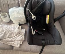 Baby blanket, car seat, sterilizer and bottle warmer. They all need to go together.