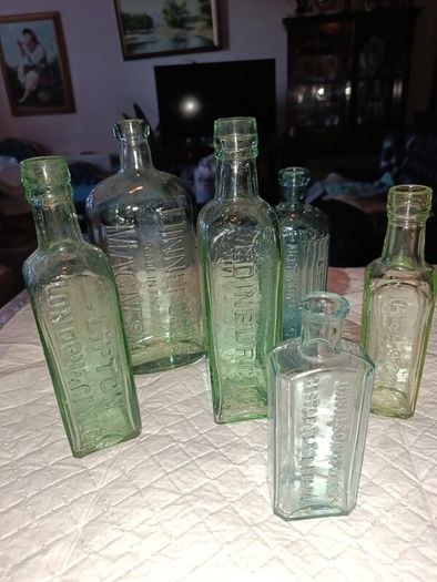 Old green bottles Lipton and others